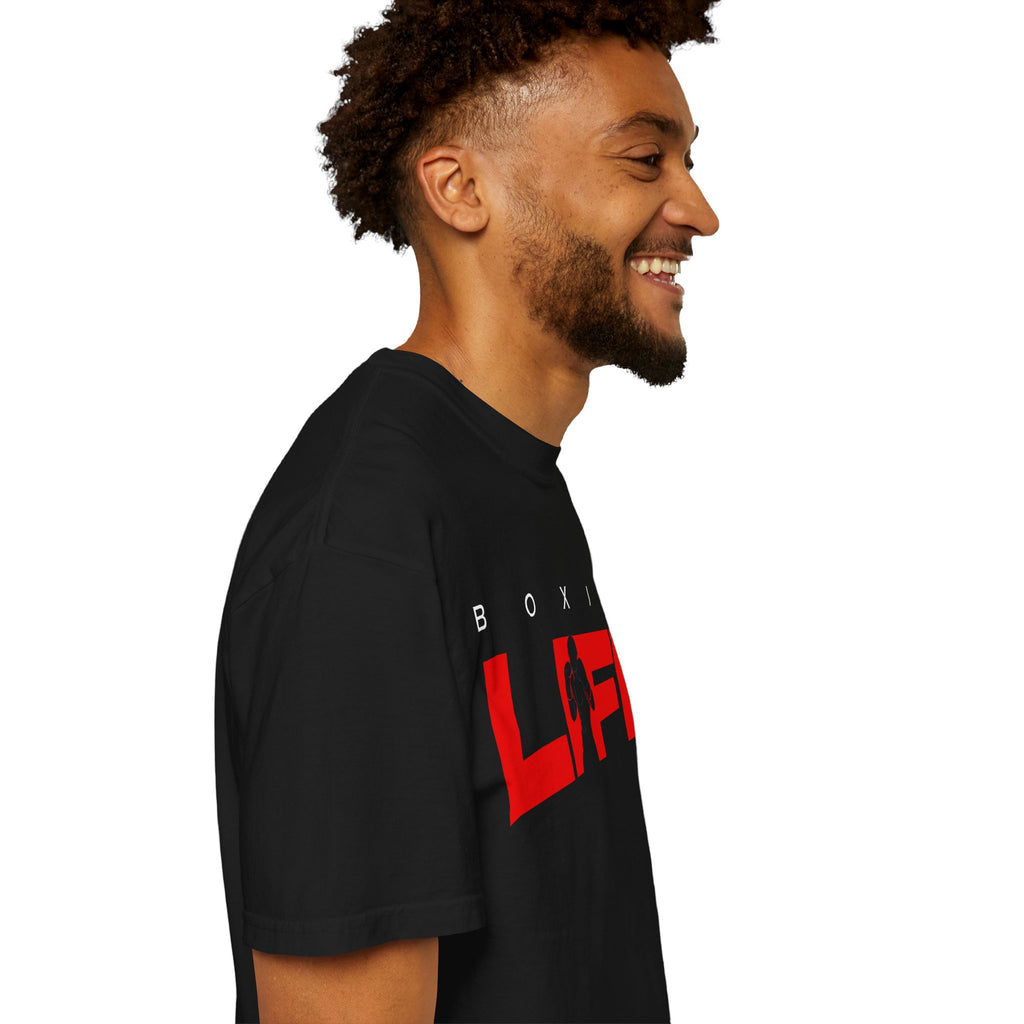 Side view of a man wearing the black Mencity Boxing Life t-shirt with red LIFE graphic