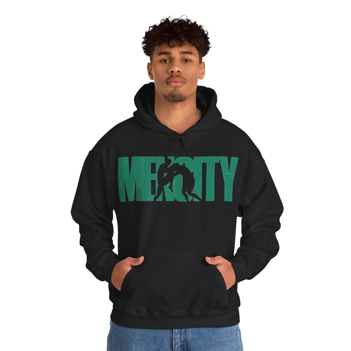 Man wearing the black Mencity Fighter gym hoodie with green MENCITY boxer wordmark, hands in the pocket
